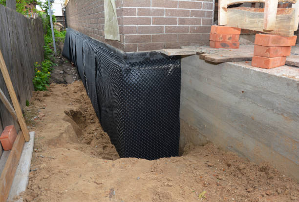 Happy homeowners after waterproofing job in Titusville